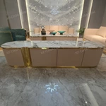 White Marble-Top TV Stand with Fluted Cream Panels and Central Metal Column